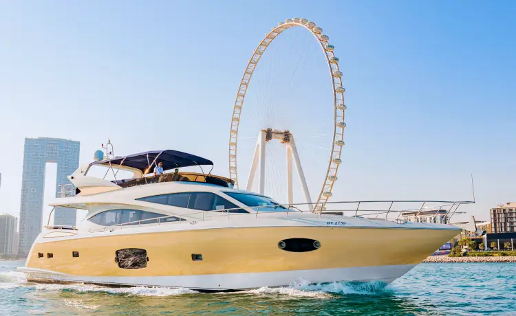 Tourists chartering a luxury yacht from Sky Walker Yachts slowly travelling on the waters near the A